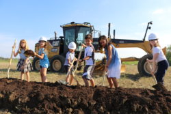 kids digging with shovels, groundbreaking